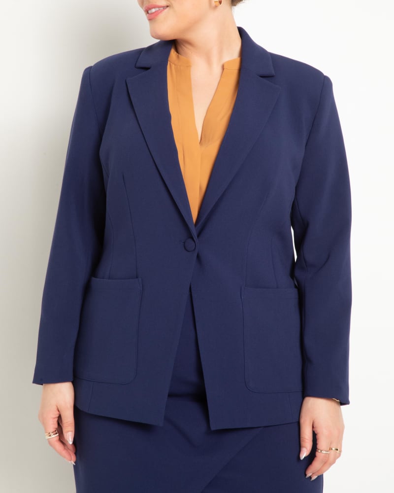 Front of a model wearing a size 18 The 365 Suit Patch Pocket Blazer in Ocean Cavern by ELOQUII. | dia_product_style_image_id:273004